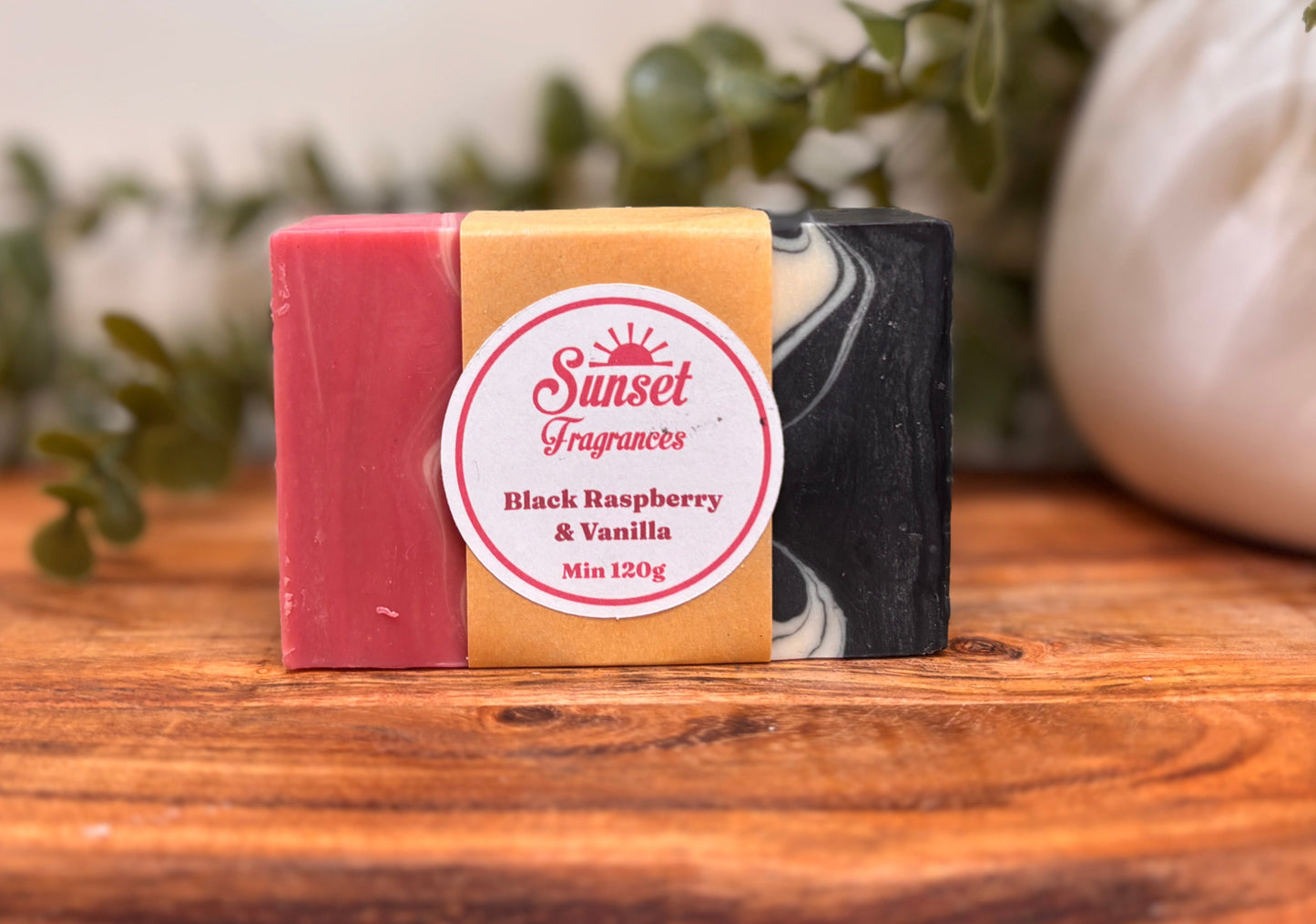 Black Raspberry & Vanilla handmade soap with packaging wrap on it